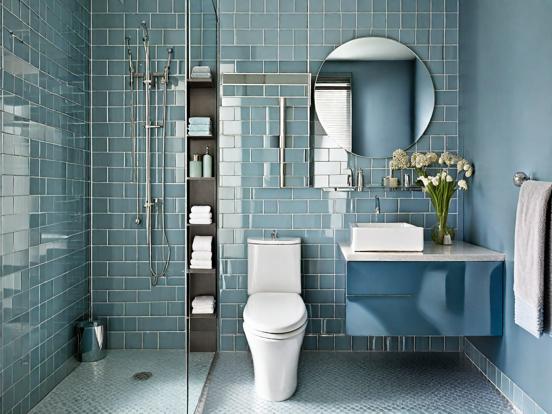 Blue tiled bathroom white toilet