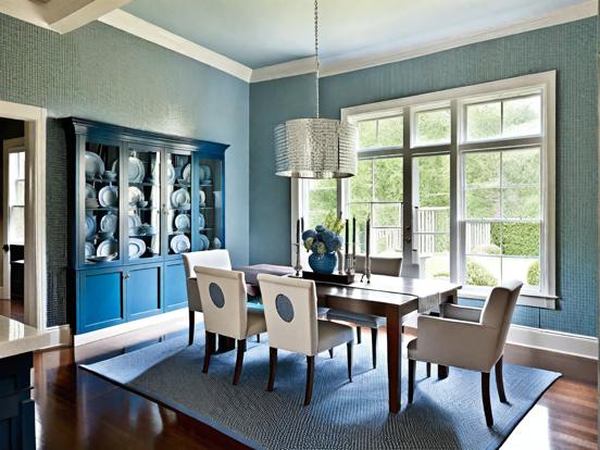 Blue dining room with cabinet