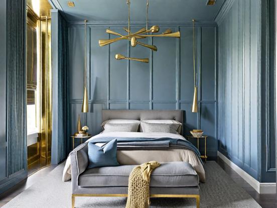 Blue gold bed closeup room