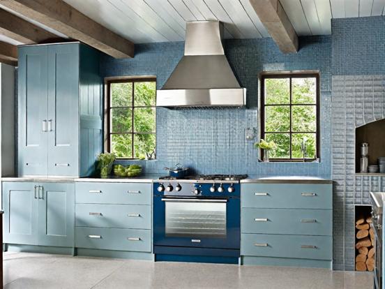 Blue kitchen stove wood cabinets