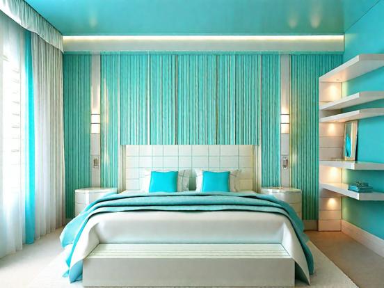 Closeup of bed blue teal room