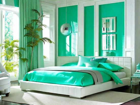 Closeup bed green teal room