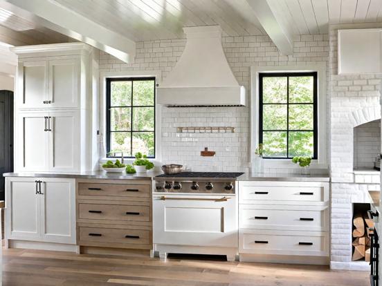 Kitchen with stove and cabinets