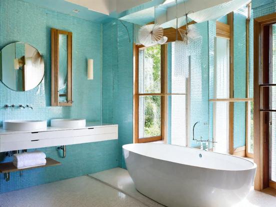 Modern teal lit bathroom design