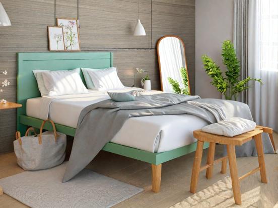 Green headboard white bed cozy