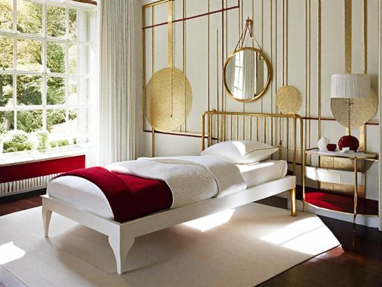 Red gold bedroom with mirror