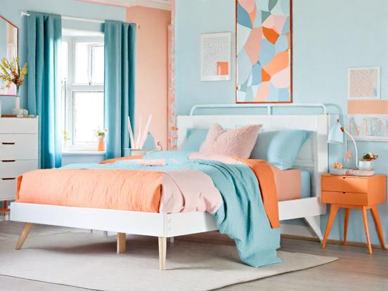 Bed with blue orange comforter