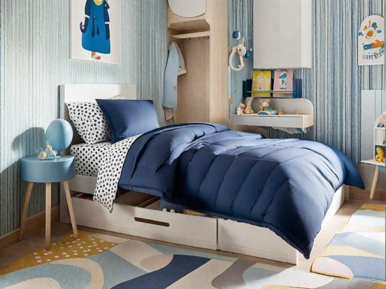 Blue kids room with cozy bed