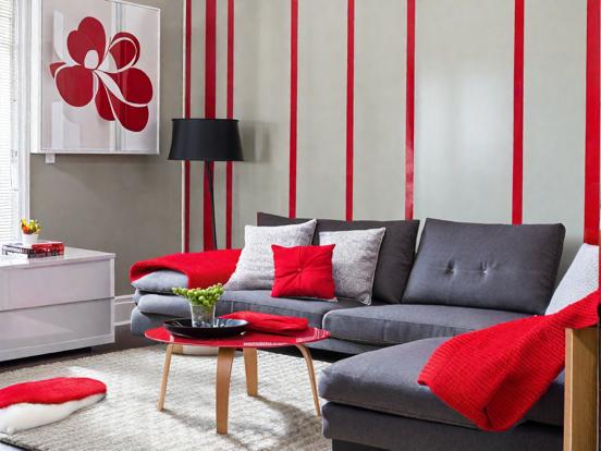 Gray couch red accents room