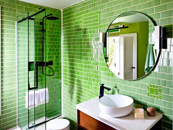 Green tiled bath white fixtures