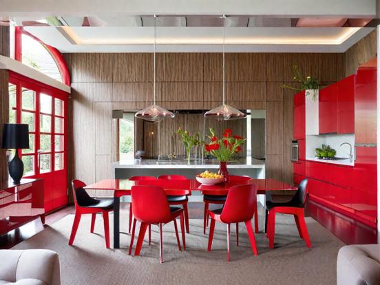 Red table chairs bold room