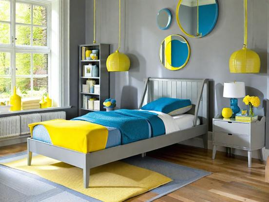 Closeup of bed with blue yellow